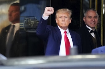 caption: Former President Donald Trump leaves Trump Tower in New York on Tuesday, April 4, 2023. 