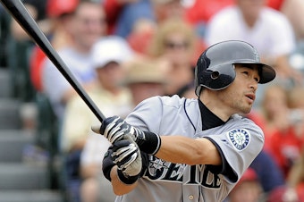 caption: FILE - Seattle Mariners' Ichiro Suzuki, of Japan, hits a solo home run during the sixth inning of a baseball game against the Los Angeles Angels, Sunday, May 31, 2009, in Anaheim, Calif.