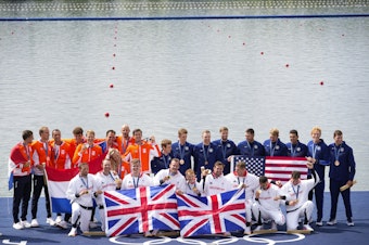 caption: Silver medalists, left, Team Netherlands, gold medalists, front, Team Britain and bronze medalists the United States Team pose during a medals ceremony at the 2024 Summer Olympics, Saturday, Aug. 3, 2024, in Vaires-sur-Marne, France. 
