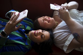 caption: Hosts of Text Me Back, Meagan Hatcher-Mays, left, and Lindy West, right, portrayed on Friday, February 16, 2024, in Seattle. 