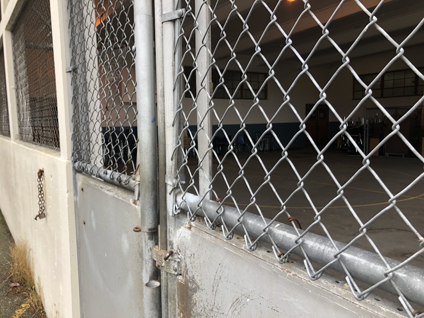 caption: The outdoor play court at View Ridge Elementary School in northeast Seattle, as pictured on November 19, 2020. A second-grade boy was kept there by the principal. The boy stayed there for hours, sometimes up to a day, according to staff, and took his lunch seated on the concrete floor. 