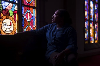 caption: Marsha Tolon poses for a portrait at University Christian Church, which she has been attending since 1984. The church is for sale because its dwindling congregation cannot afford to maintain it.