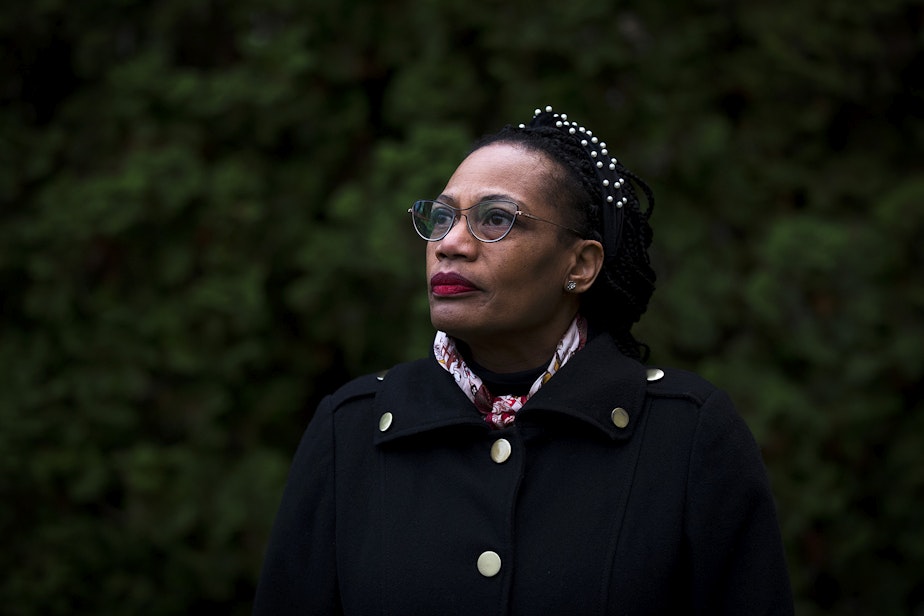 caption: Jacquelyn Flaherty, a kindergarten teacher, is portrayed on Friday, November 20, 2020, at her home in Bothell. Flaherty works at View Ridge Elementary in northeast Seattle, where she reported finding a second-grade boy placed in an outdoor enclosure dubbed by staff as "the cage."