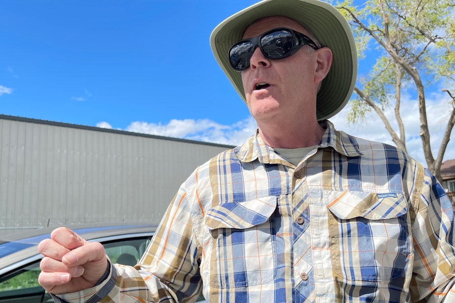 caption: Garrett Brown of the Mid-Columbia Electric Vehicle Association in Pasco, Washington, April 2023.