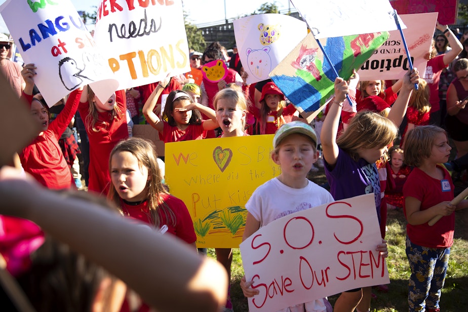 caption: Hundreds of Seattle Public Schools students and parents gathered for a rally demanding that schools remain open, ahead of the Seattle Public Schools board meeting on Wednesday, Sept. 18, 2024, at the John Stanford Center for Educational Excellence building in Seattle. 