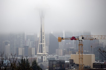 caption: A cloud hangs over downtown Seattle on Tuesday, November 21, 2017, shown from Kerry Park. 