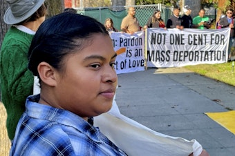 caption: Immigration advocates hold a rally in Sacramento, Calif. on Monday, Dec. 2, 2024, to protest President-Elect Donald Trump's plans to conduct mass deportation of immigrants without legal status.