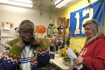 caption: Mary Wesley, left, pictured with assistant Sue Grimord.  Wesley's flower shop, Flowers Just 4U, has been a fixture in Seattle's Central District since 1984.