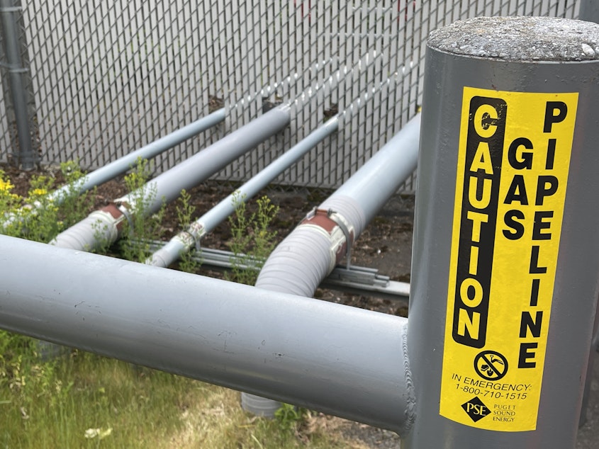 caption: Natural gas pipelines enter a building on the University of Washington campus in Seattle on May 19, 2023.