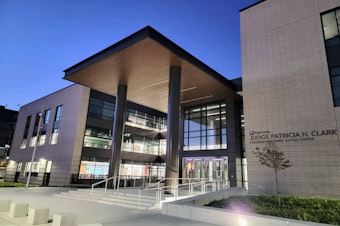 caption: The King County Judge Patricia H. Clark Children and Family Justice Center is shown in Seattle. 