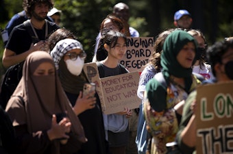 caption: University of Washington students gather ahead of the UW Board of Regents meeting on Thursday, May 9, 2024, on campus in Seattle. 