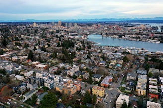 caption: Fremont and the University District neighborhoods are shown as the sun goes down on Tuesday, December 10, 2024, in Seattle. 