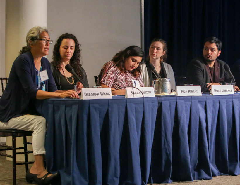 caption: KUOW's Deborah Wang presents highlights of her year-long mental health project together with other recipients of the 2018-2019 Rosalynn Carter Mental Health Journalism Fellowship.