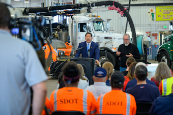 caption: Seattle Mayor Bruce Harrell introduces his 2023-24 budget proposal while speaking to a crowd of city employees at the Charles Street Vehicle Maintenance Facility, Sept. 27, 2022. 